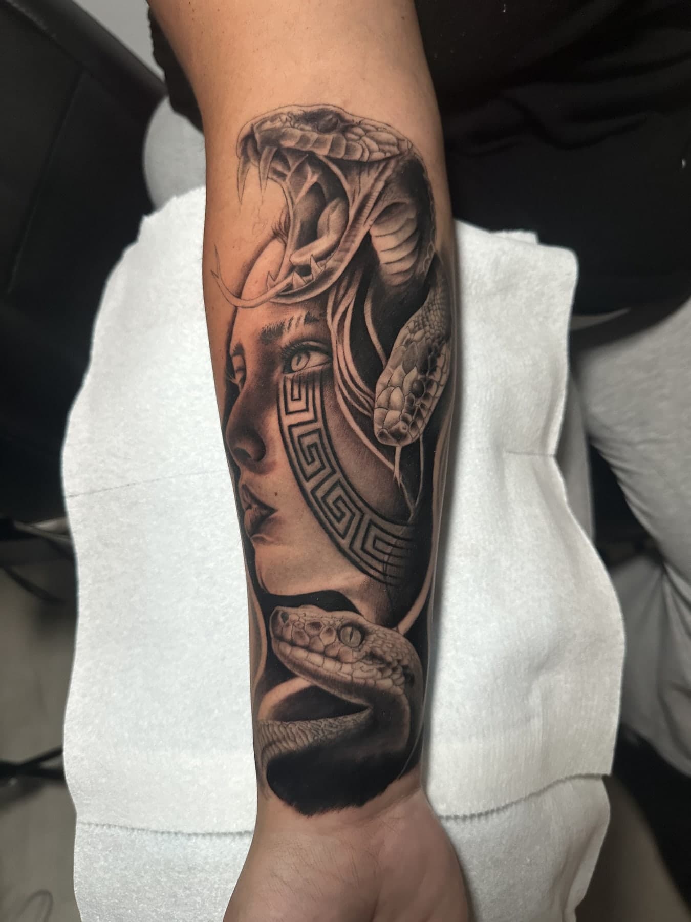 Medusa with serpents — black & gray realism